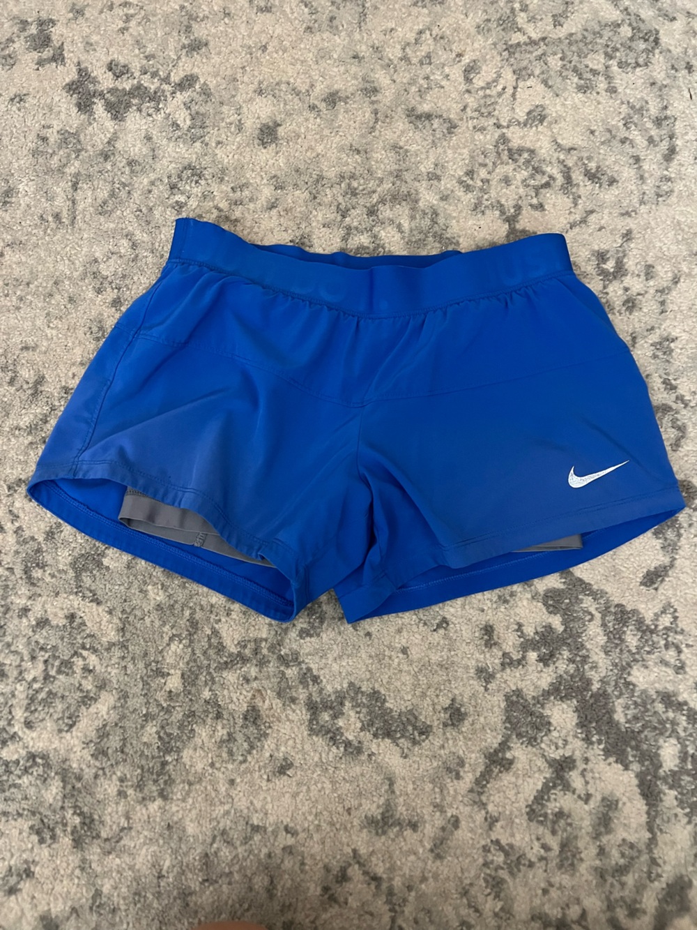 Nike Women’s Royal Blue Athletic Shorts with White Swoosh